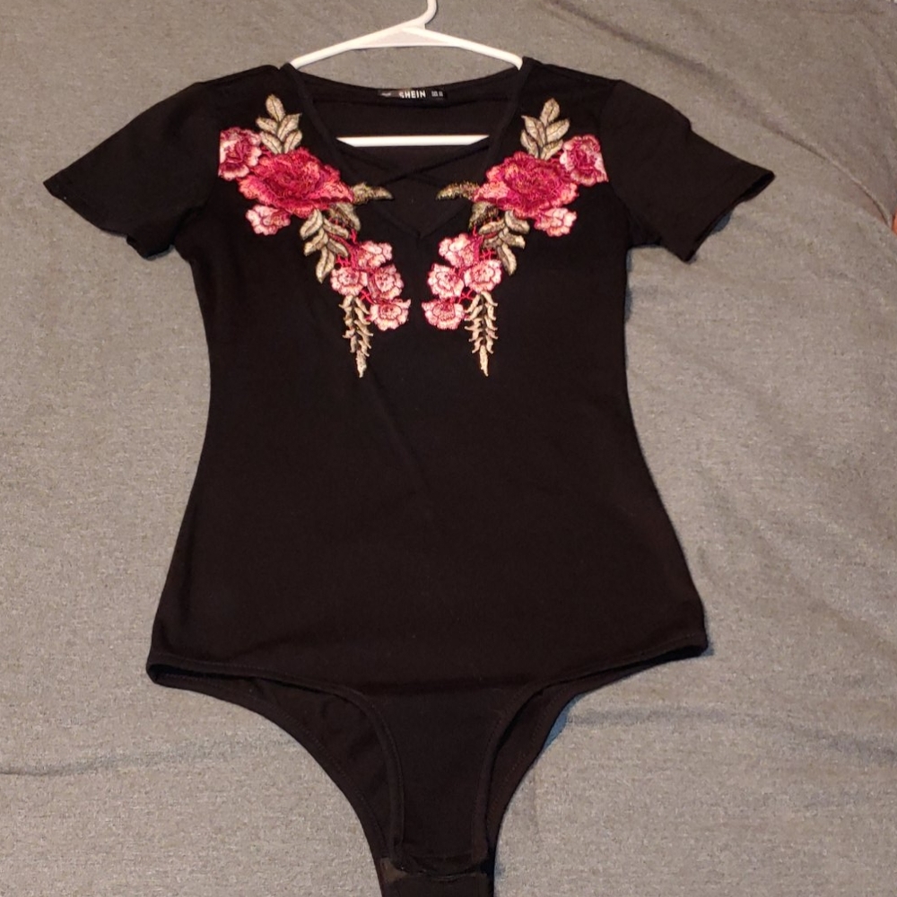 Never worn body suit